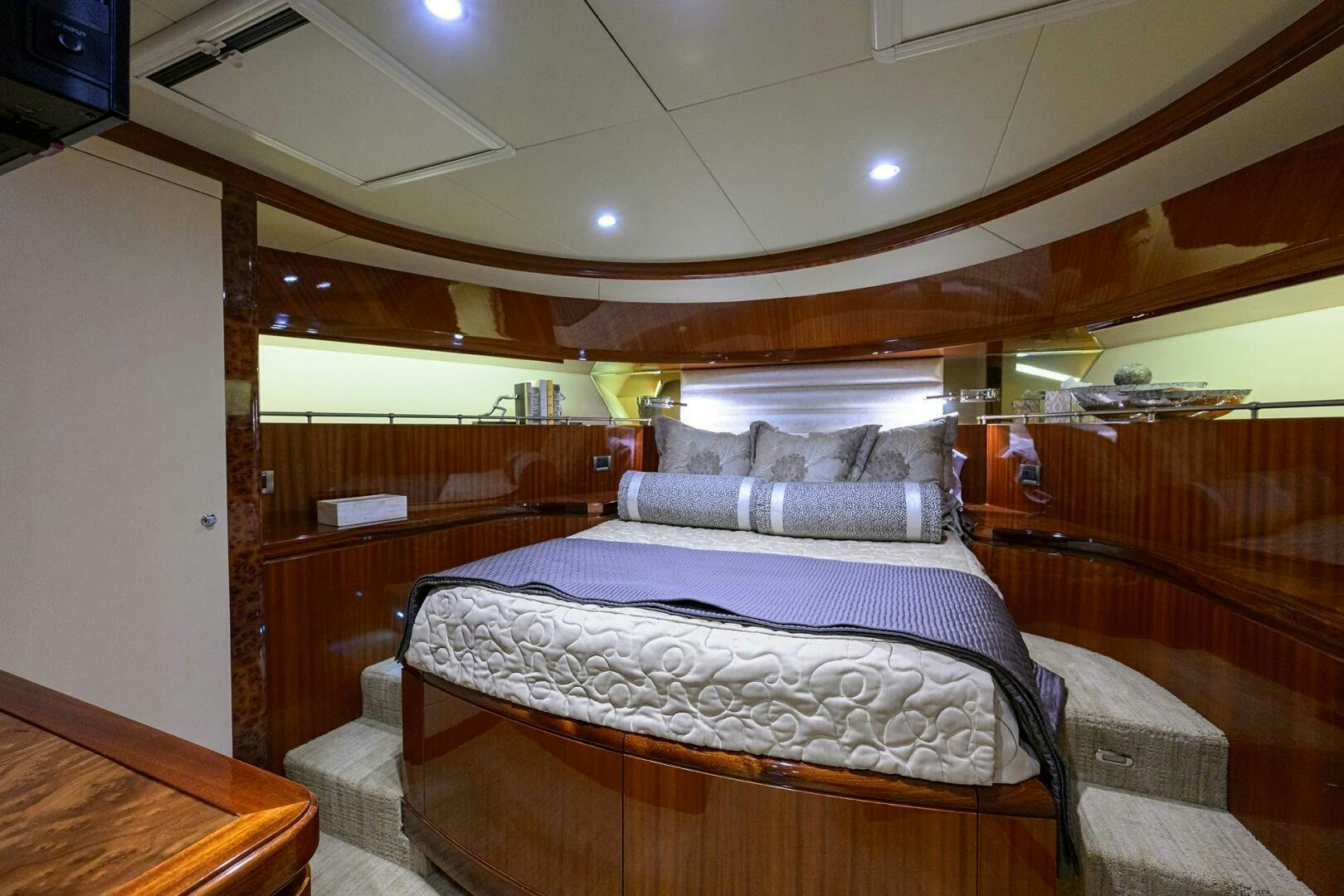 a bedroom with a bed aboard JANE E Yacht for Sale