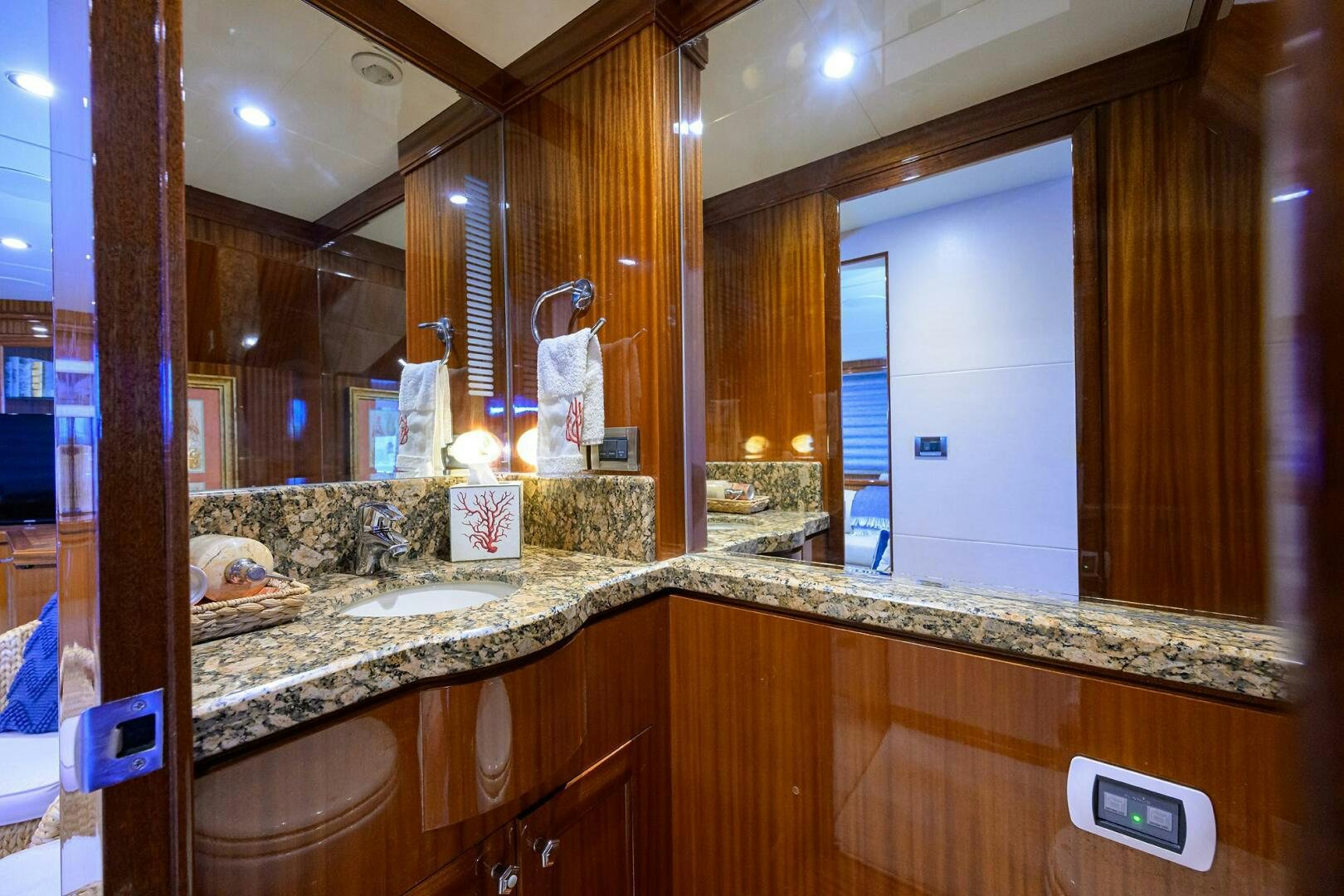 a bathroom with a large mirror aboard JANE E Yacht for Sale