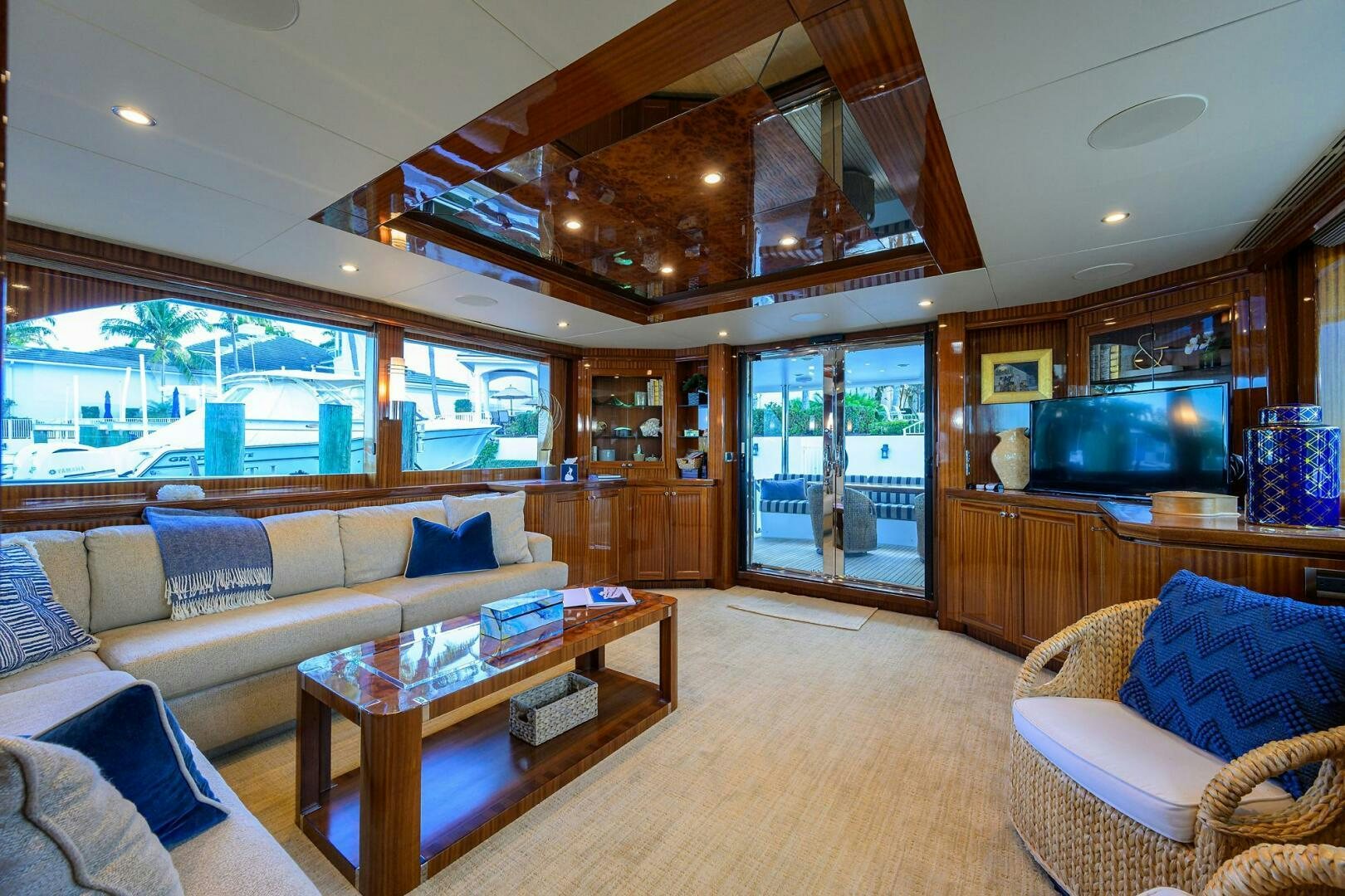 a living room with a large wood ceiling aboard JANE E Yacht for Sale