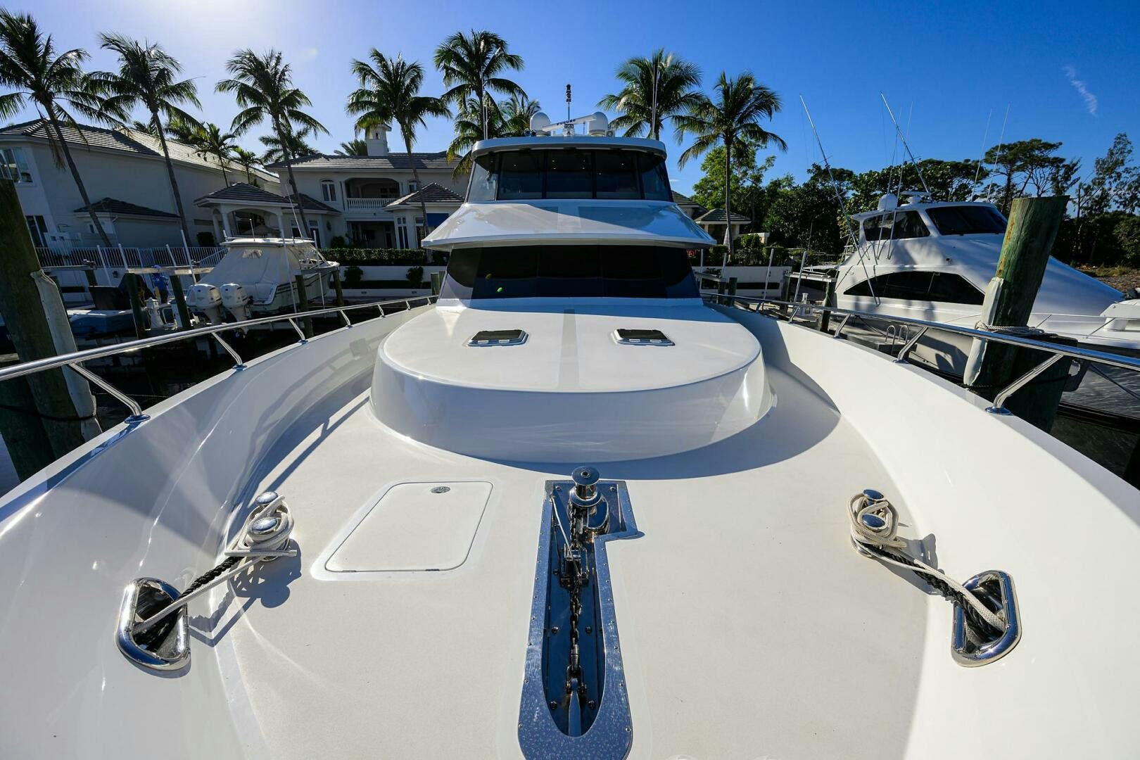 a white boat with a rope attached to it aboard JANE E Yacht for Sale