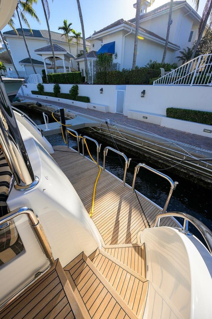a deck with a pool aboard JANE E Yacht for Sale