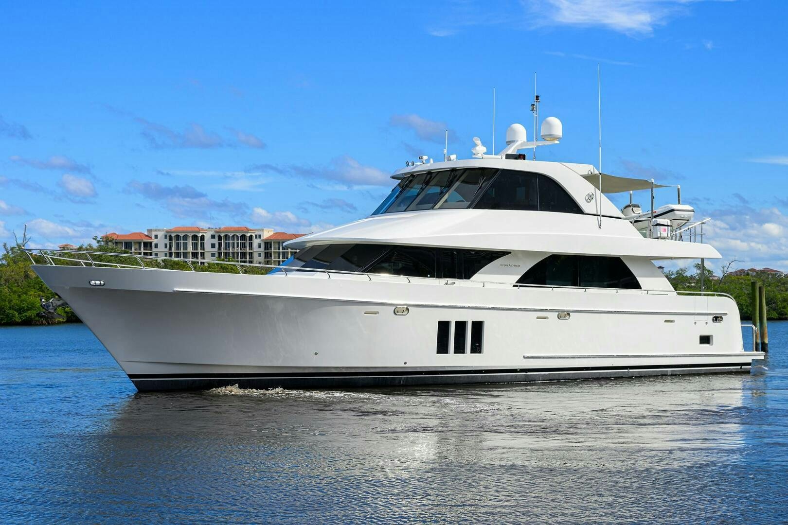 a white yacht on the water aboard JANE E Yacht for Sale