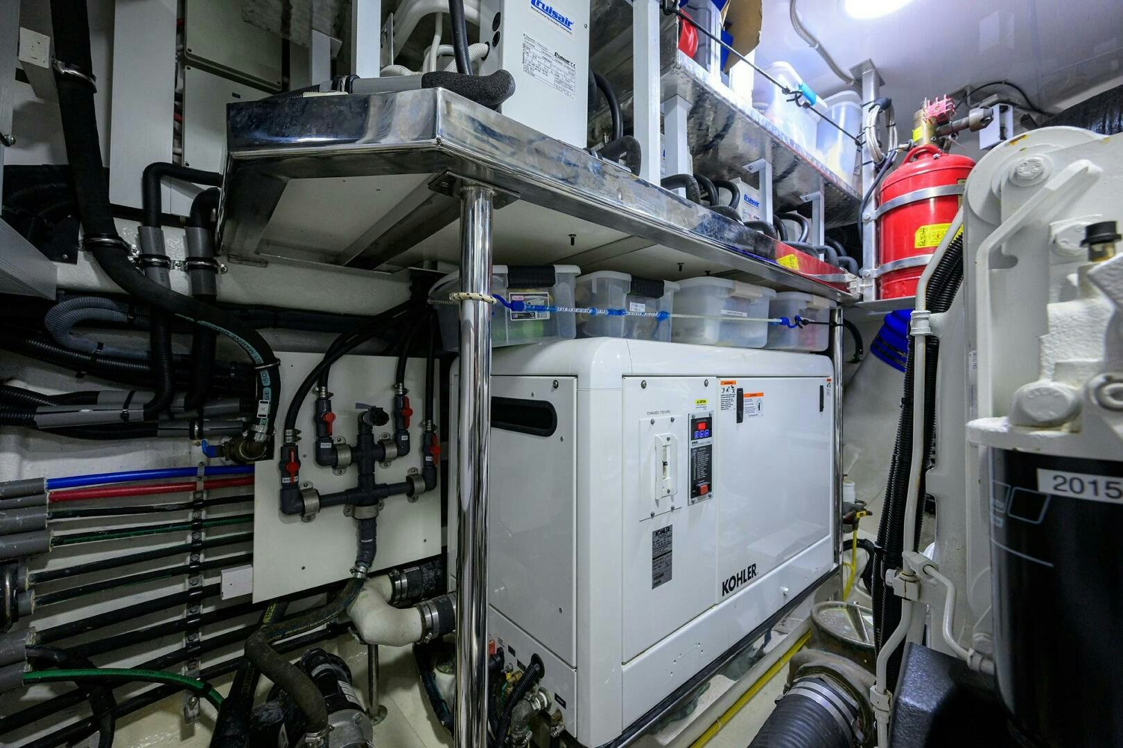 a machine with a large piece of equipment in it aboard JANE E Yacht for Sale