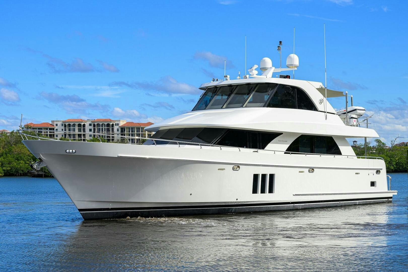 a white yacht on the water aboard JANE E Yacht for Sale