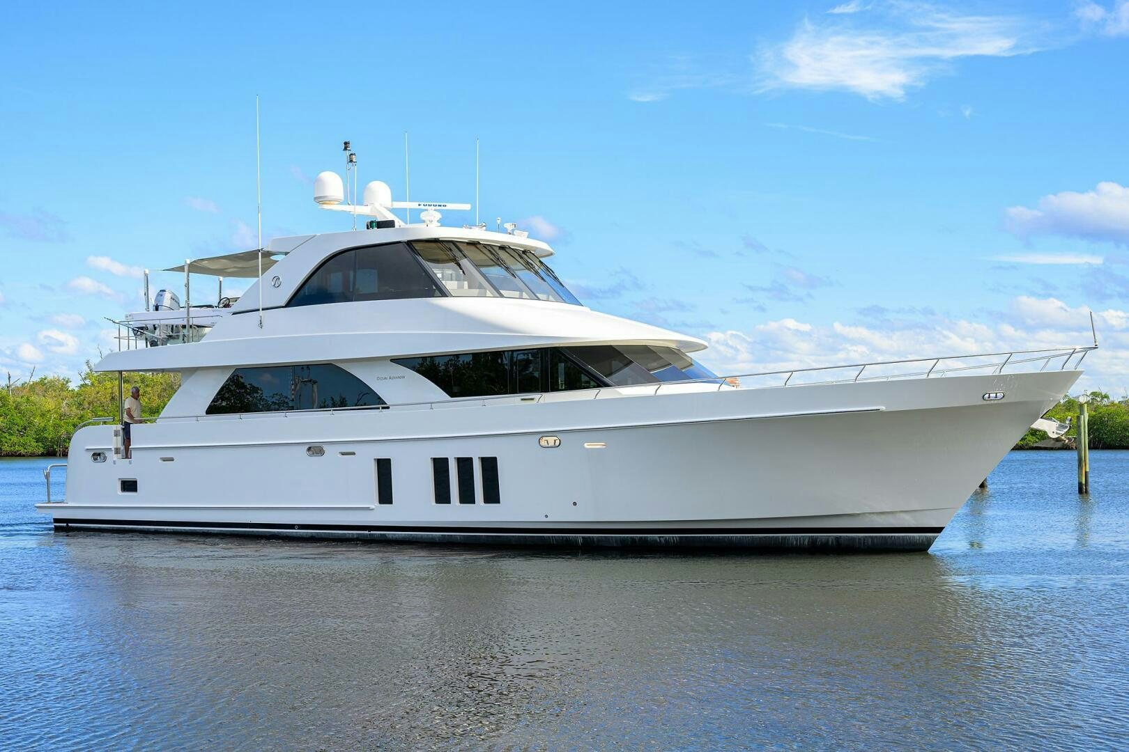 a white yacht on the water aboard JANE E Yacht for Sale