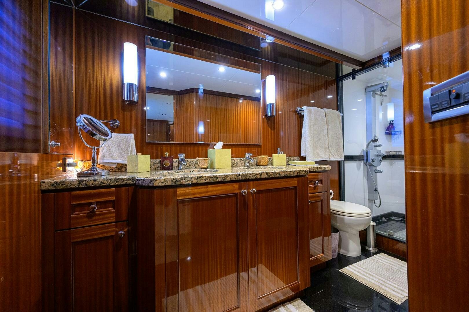 a bathroom with a large mirror aboard JANE E Yacht for Sale