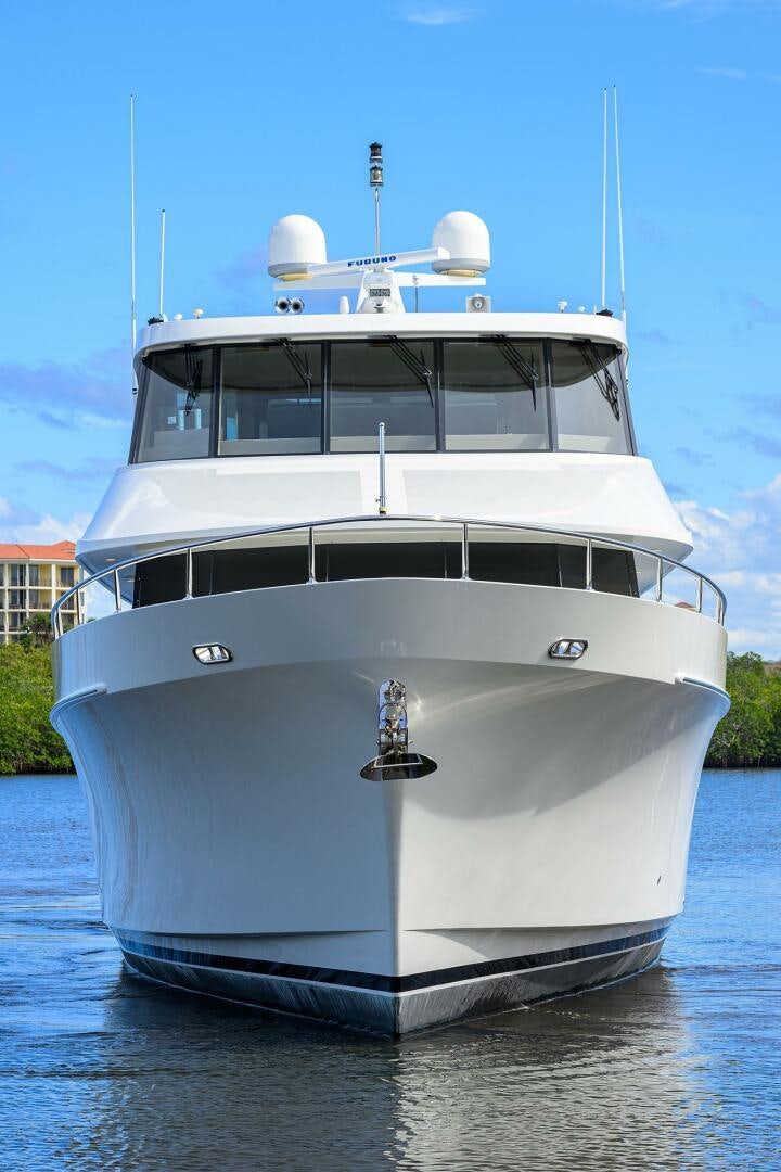 a white boat in the water aboard JANE E Yacht for Sale