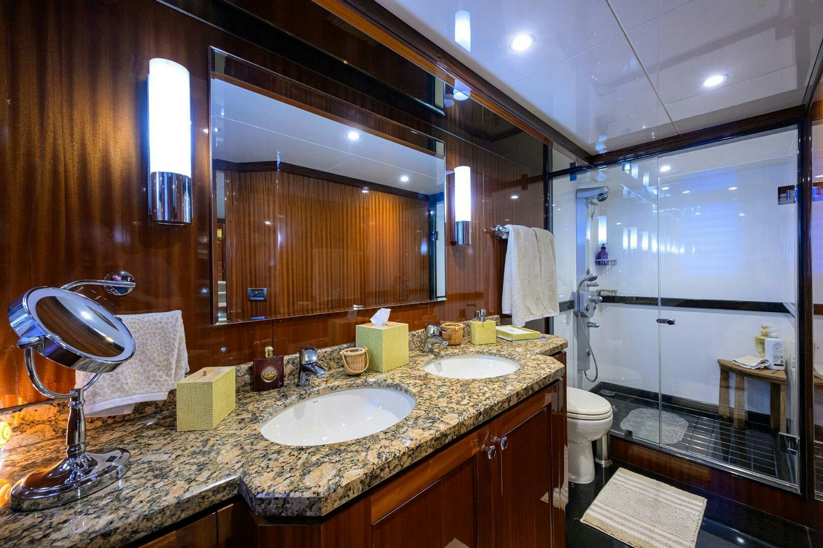 a bathroom with a large mirror aboard JANE E Yacht for Sale
