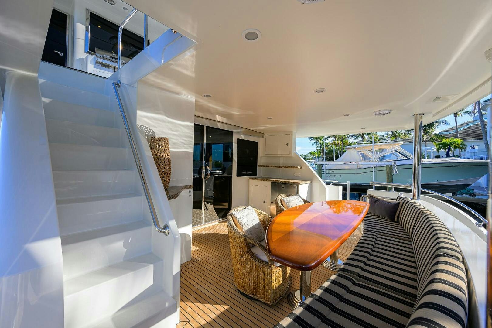 a room with a couch and a table and a chair aboard JANE E Yacht for Sale