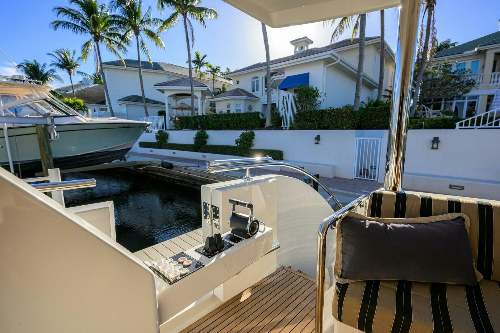 a deck with a pool and a deck with a deck and trees aboard JANE E Yacht for Sale