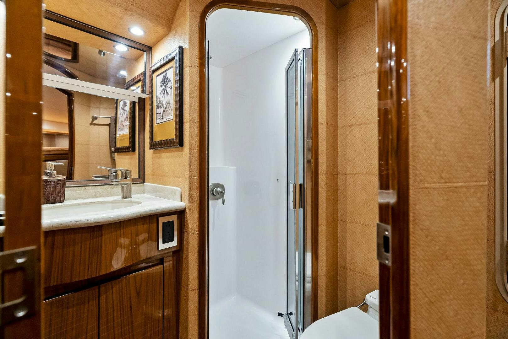 a bathroom with a glass shower aboard FORTY NINER Yacht for Sale