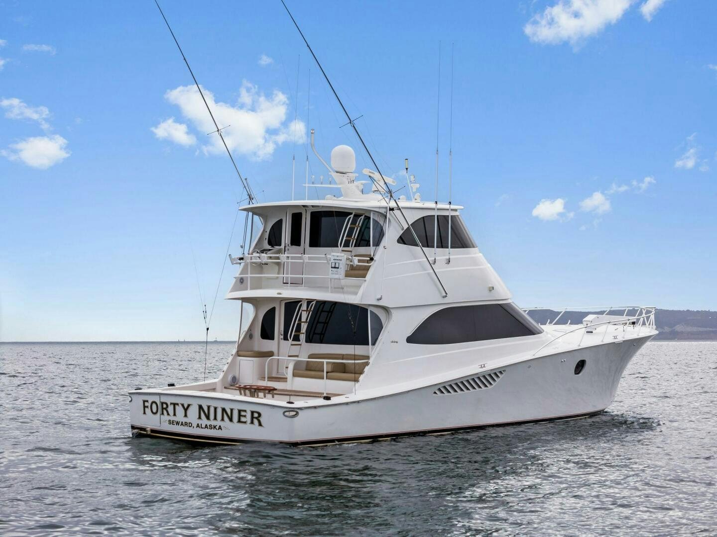 a white boat on the water aboard FORTY NINER Yacht for Sale