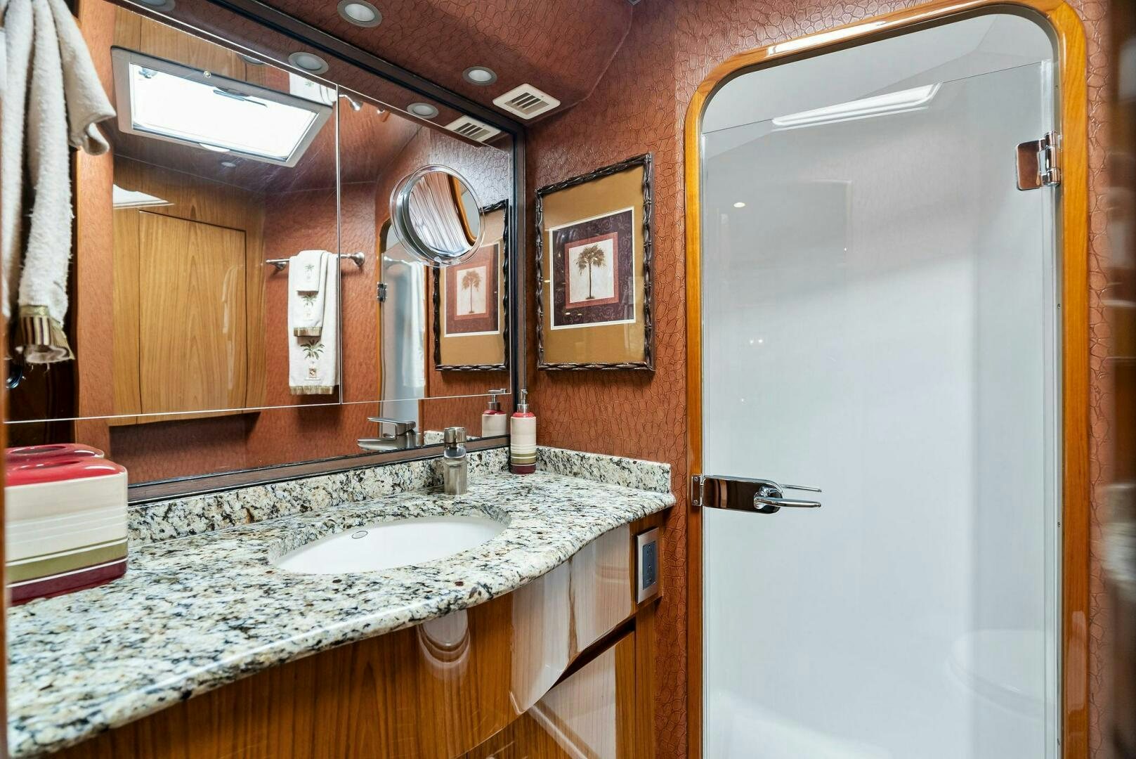 a bathroom with a large mirror aboard FORTY NINER Yacht for Sale