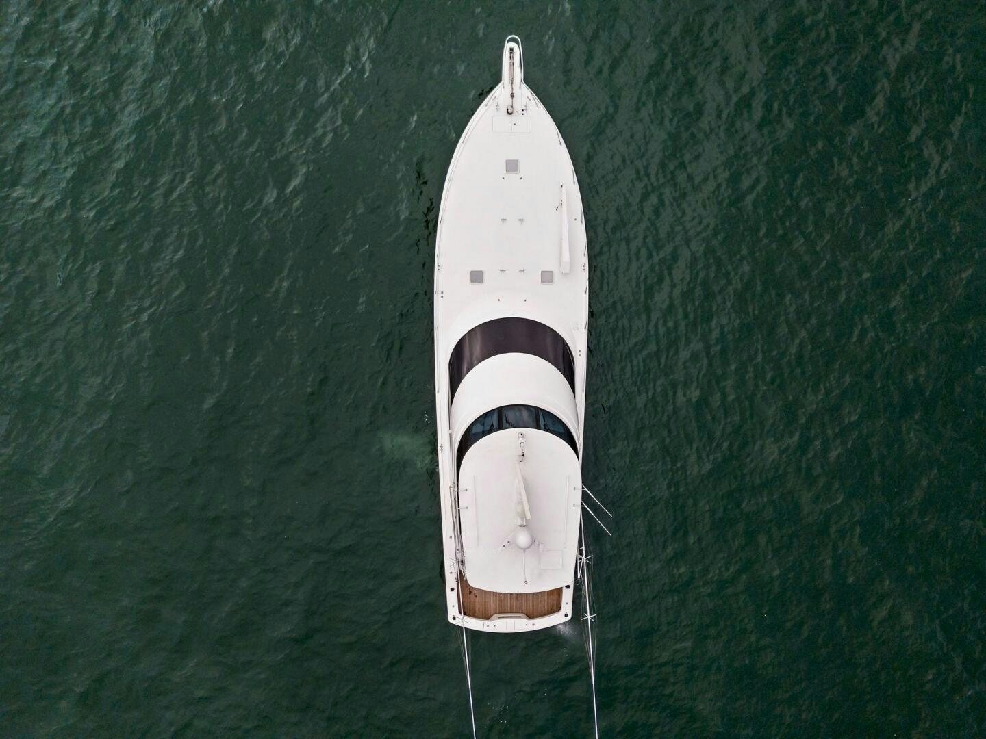 a white boat in the water aboard FORTY NINER Yacht for Sale