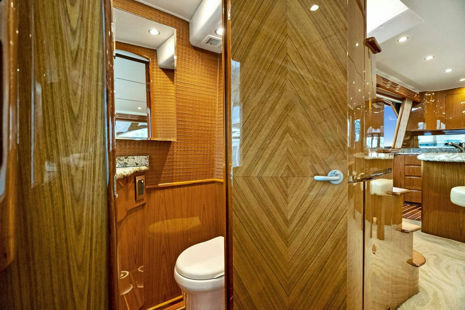 a bathroom with wood walls aboard FORTY NINER Yacht for Sale