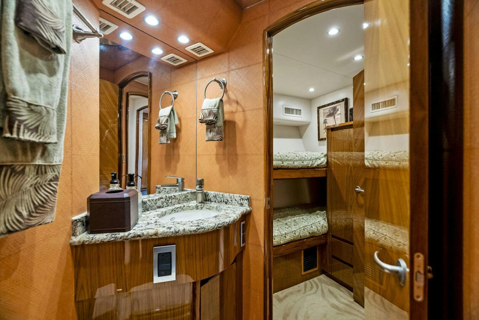 a bathroom with a sink and a mirror aboard FORTY NINER Yacht for Sale