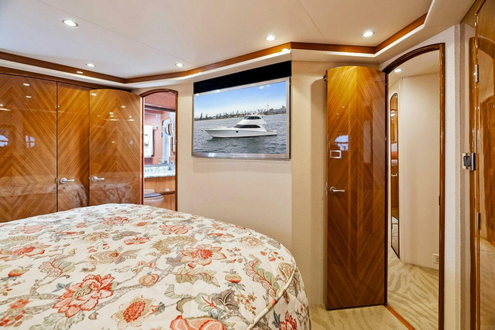 a bedroom with a large bed aboard FORTY NINER Yacht for Sale