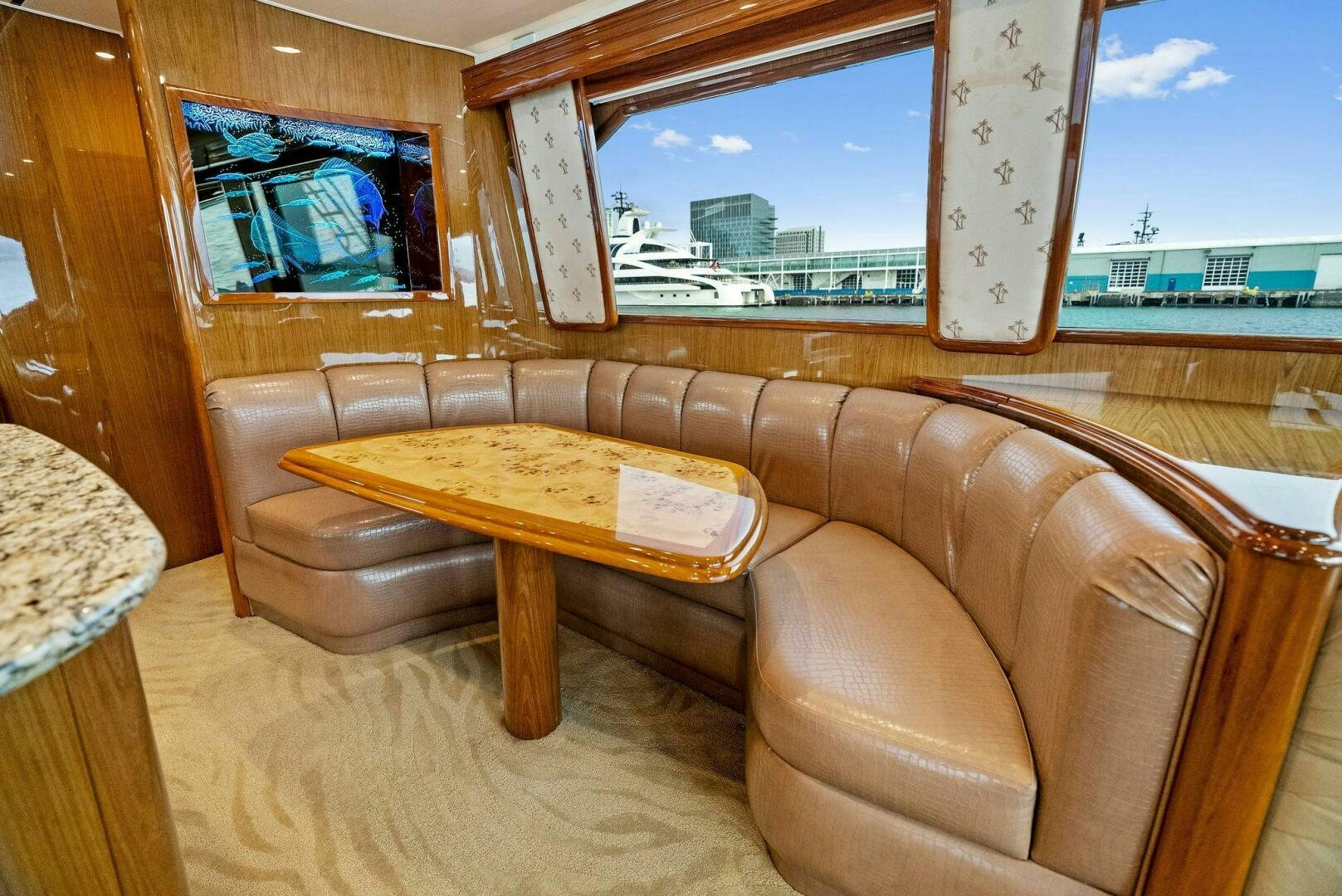 a living room with a couch and a table aboard FORTY NINER Yacht for Sale