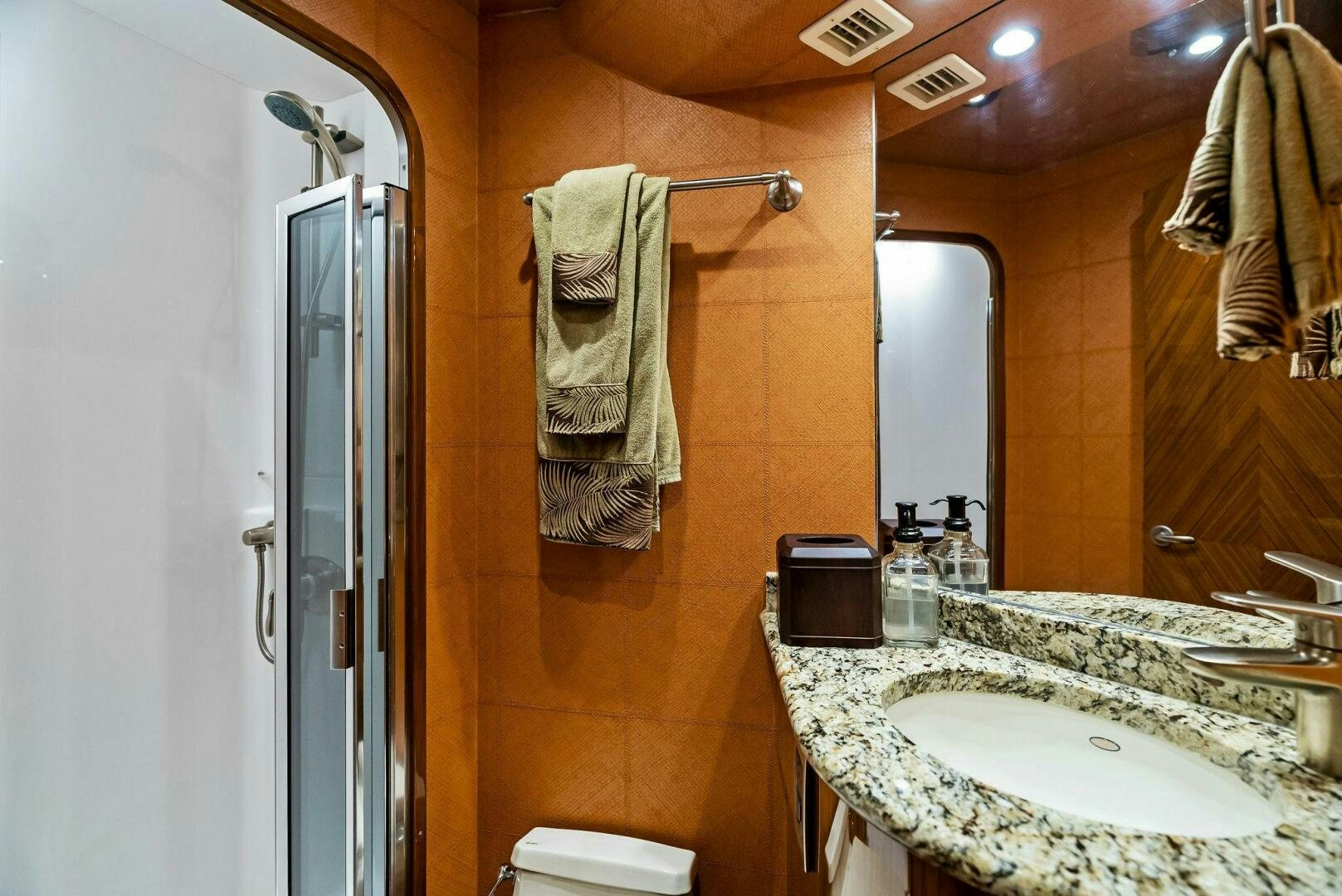 a bathroom with a sink and a mirror aboard FORTY NINER Yacht for Sale