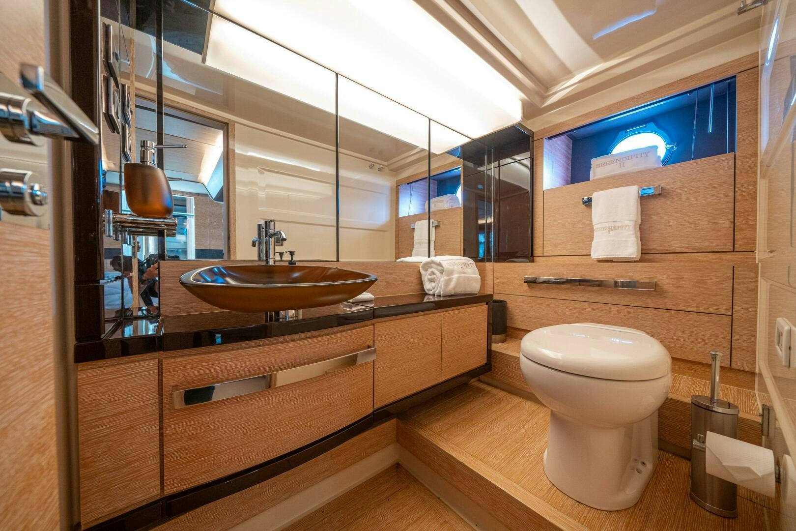 a bathroom with a sink and toilet aboard SERENDIPITY II Yacht for Sale