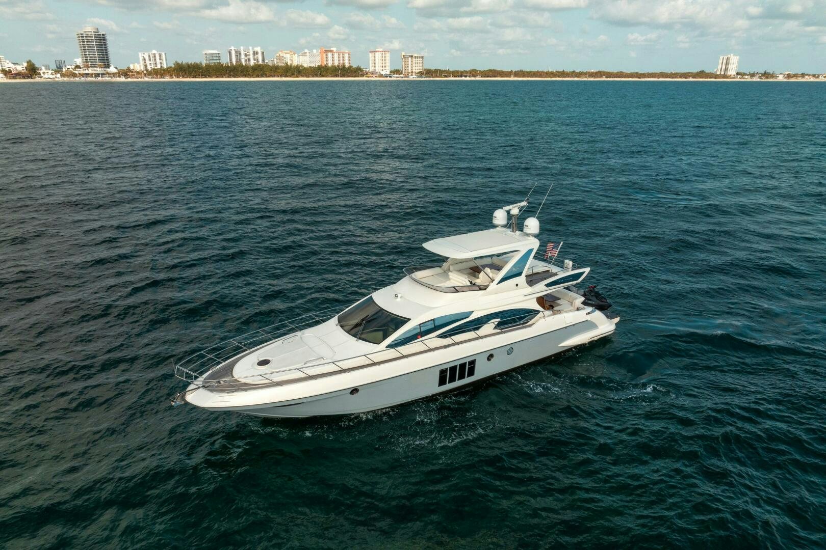 a white boat in the water aboard SERENDIPITY II Yacht for Sale