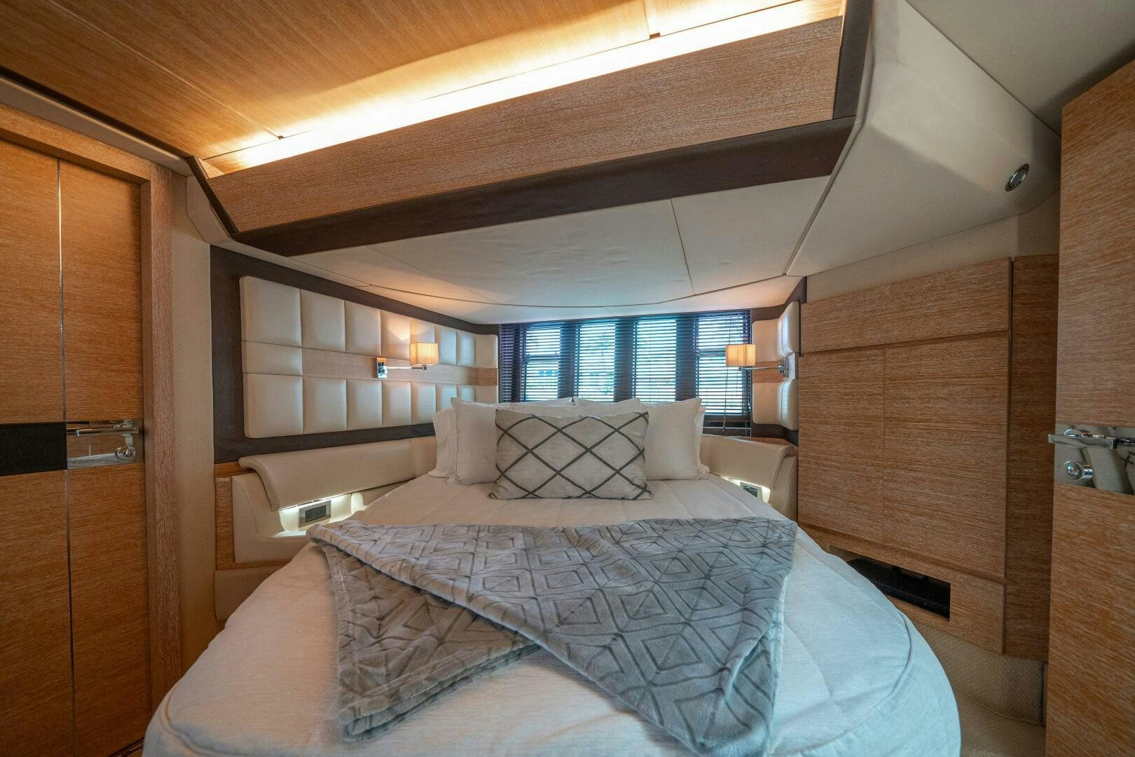 a bed in a room aboard SERENDIPITY II Yacht for Sale