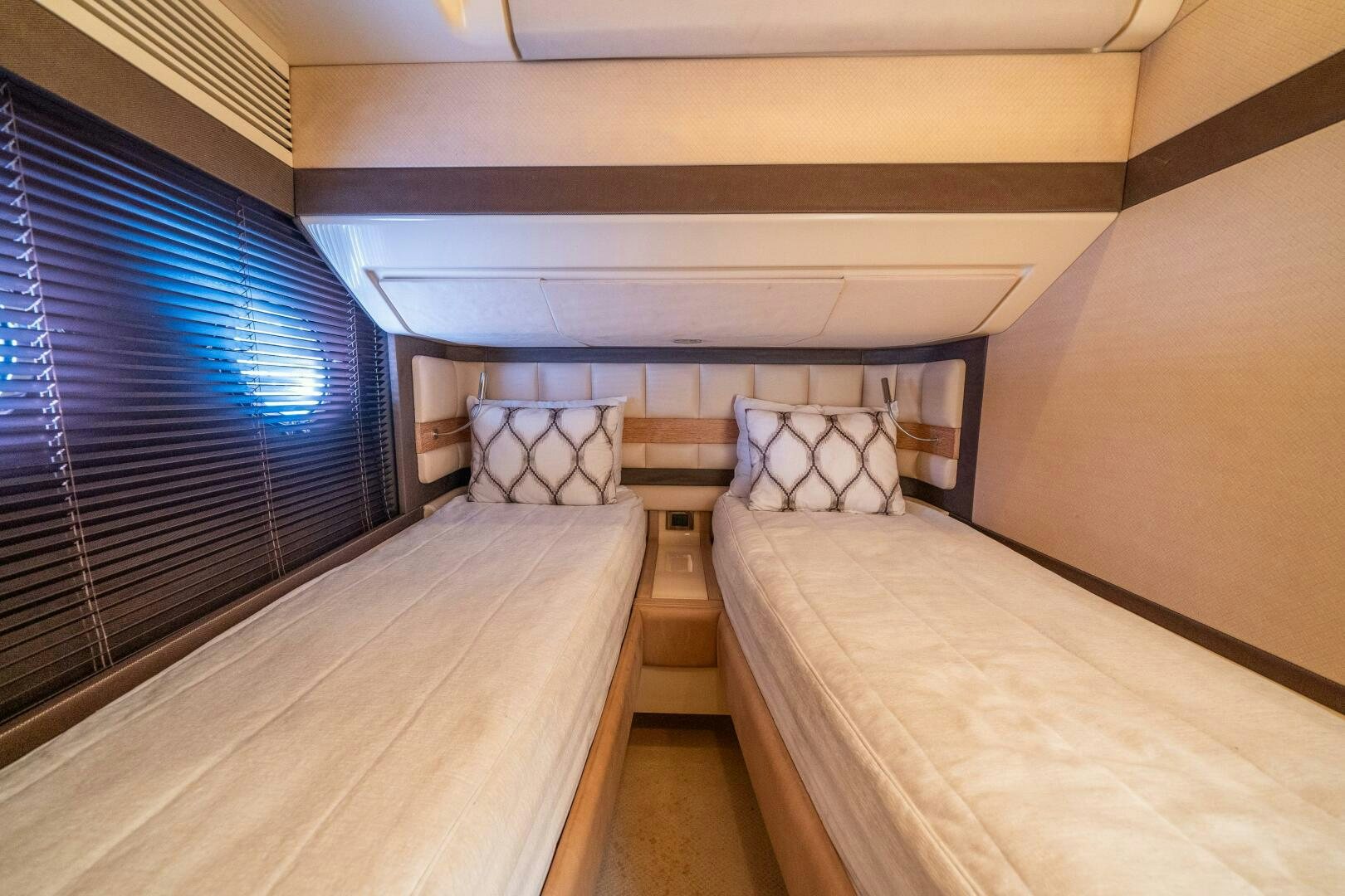 a bed in a room aboard SERENDIPITY II Yacht for Sale