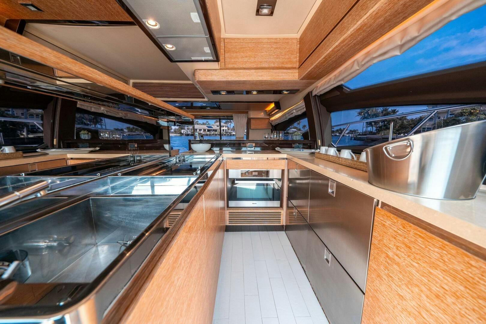 a large kitchen with stainless steel appliances aboard SERENDIPITY II Yacht for Sale