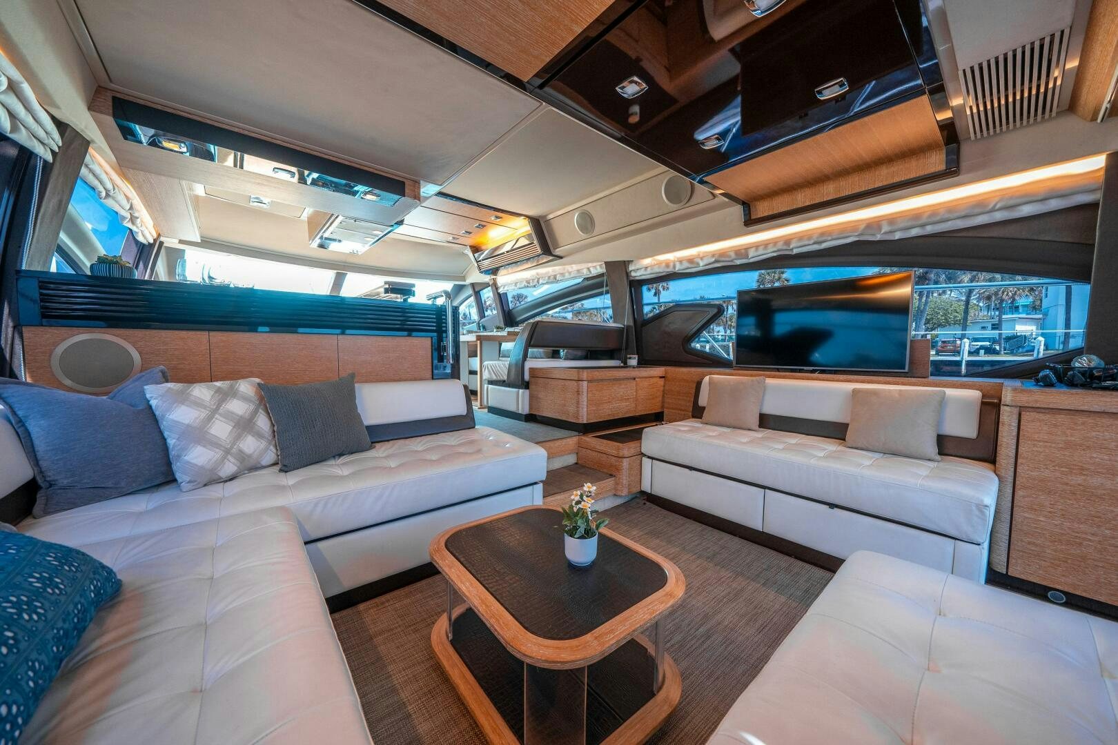 a room with a couch and a table aboard SERENDIPITY II Yacht for Sale