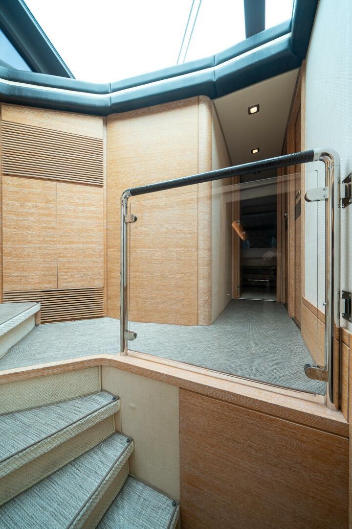 a bathroom with a glass door aboard SERENDIPITY II Yacht for Sale