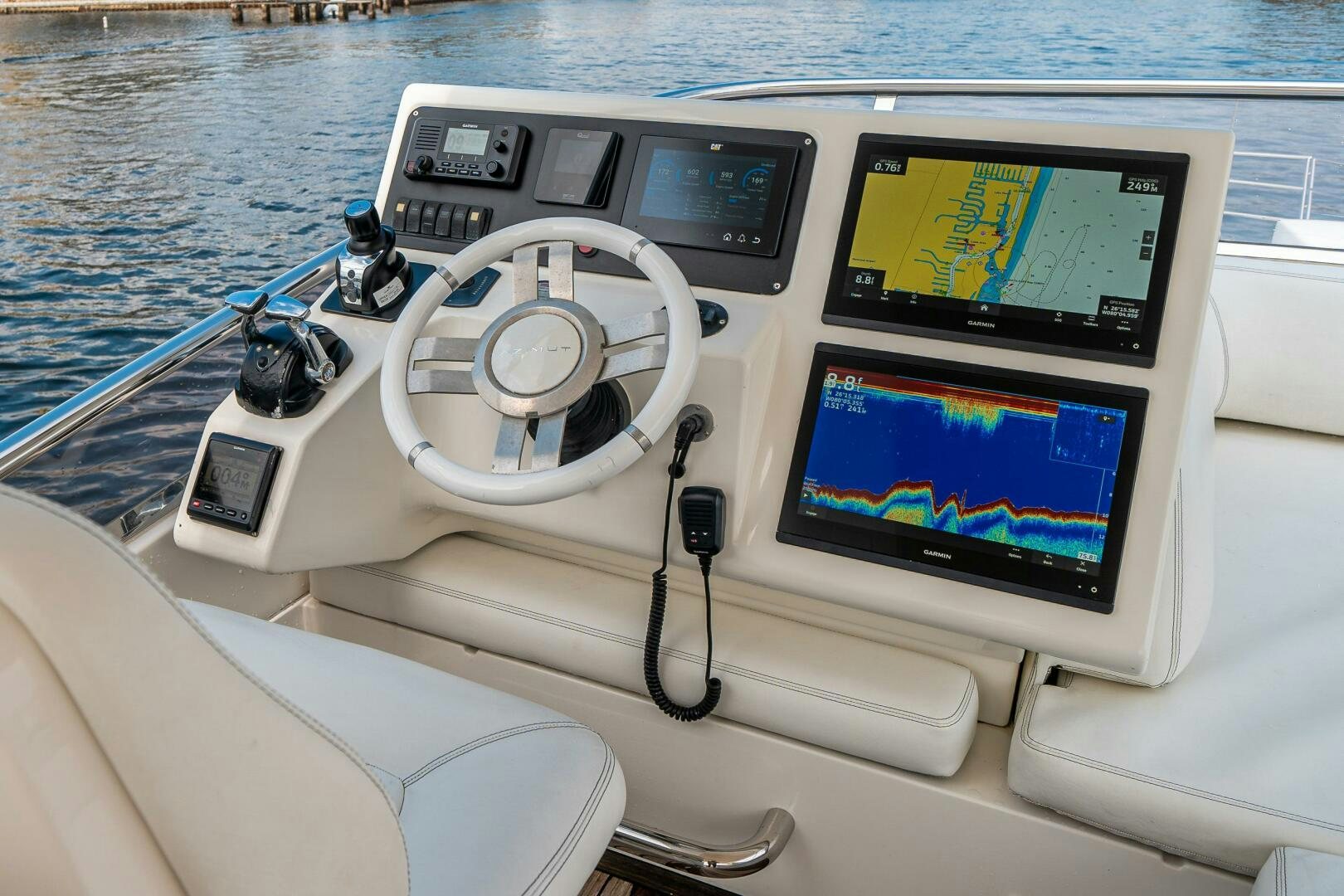 a boat with a screen and steering wheel on the front aboard SERENDIPITY II Yacht for Sale
