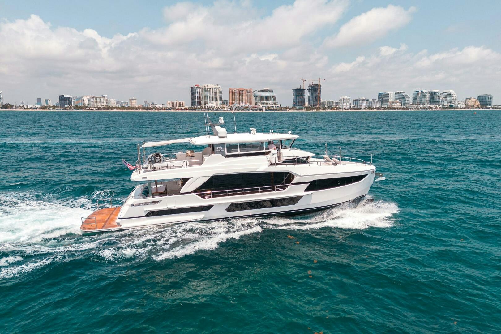 a boat on the water aboard AFTER MIDNIGHT Yacht for Sale