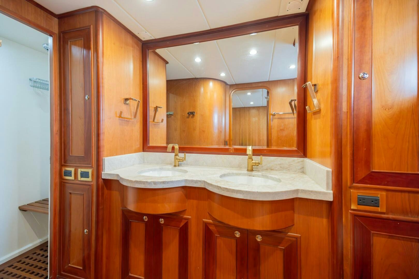 a bathroom with a large mirror aboard COLETTE Yacht for Sale