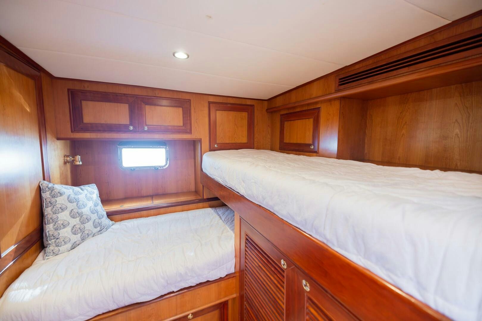 a couple of beds in a room aboard COLETTE Yacht for Sale