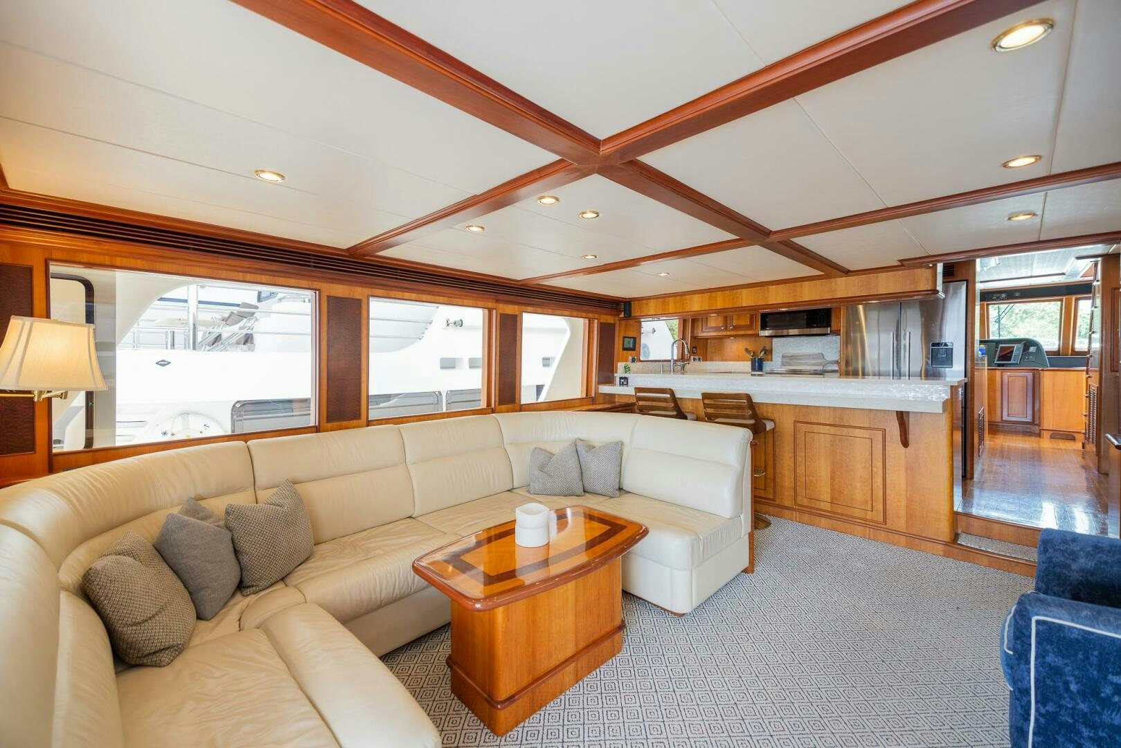 a living room with a couch and a table aboard COLETTE Yacht for Sale