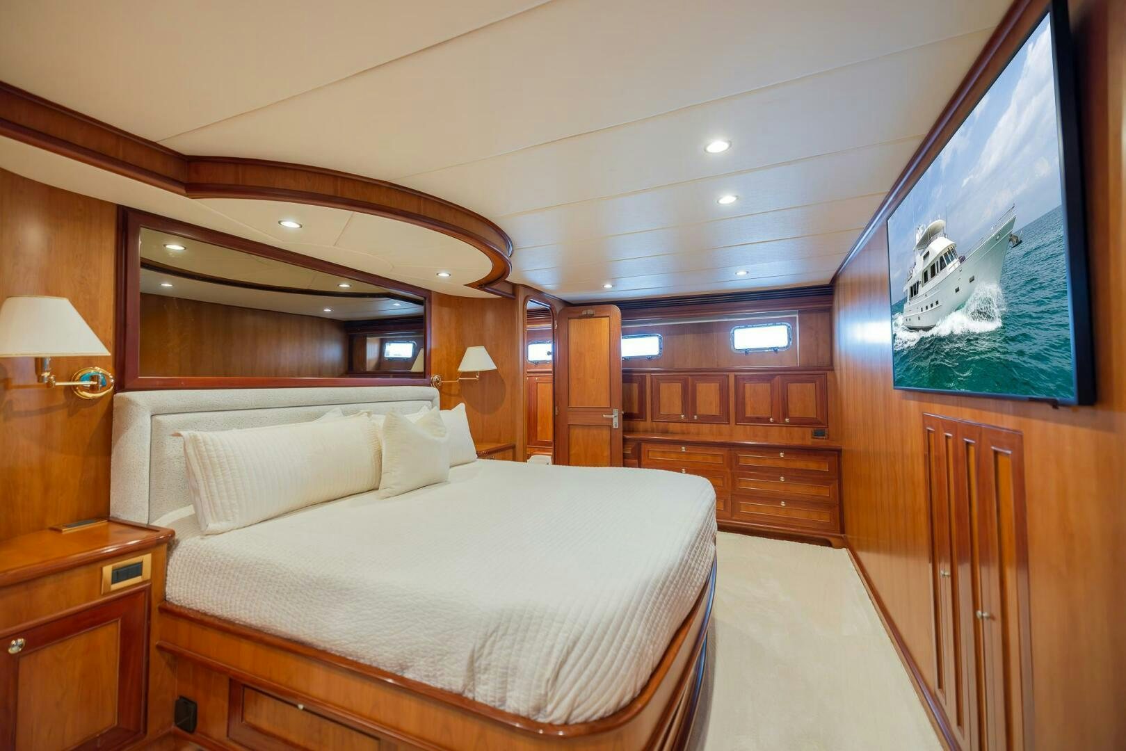 a bedroom with a large bed aboard COLETTE Yacht for Sale