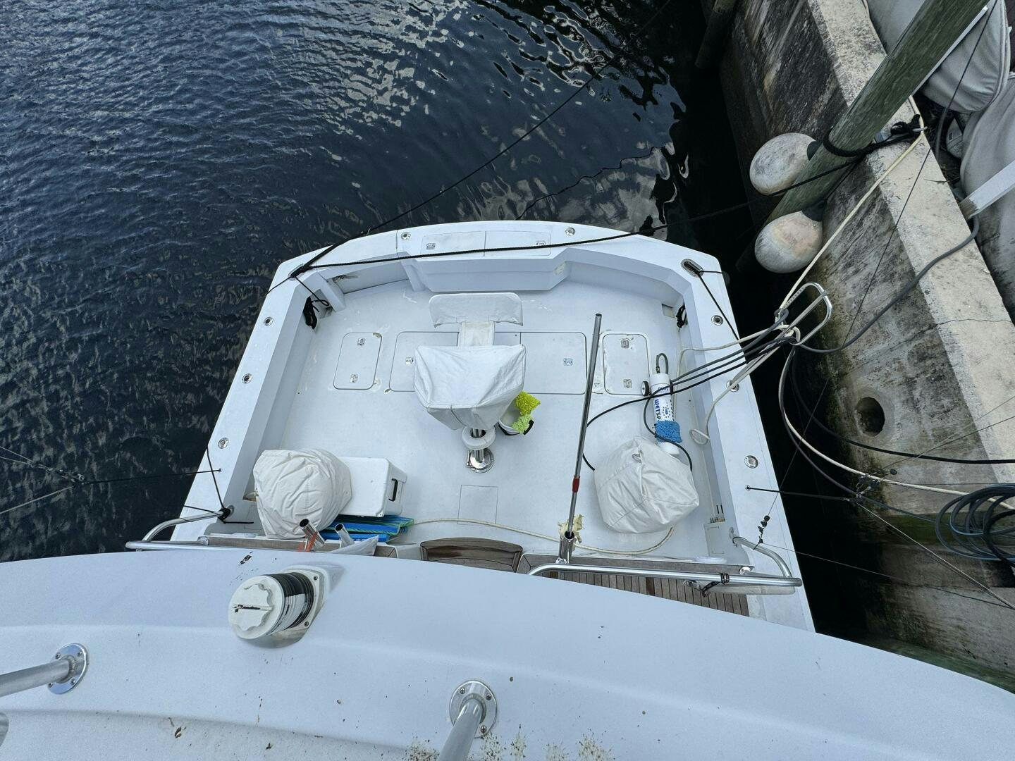 a white car with a white hood aboard MRS. Z Yacht for Sale