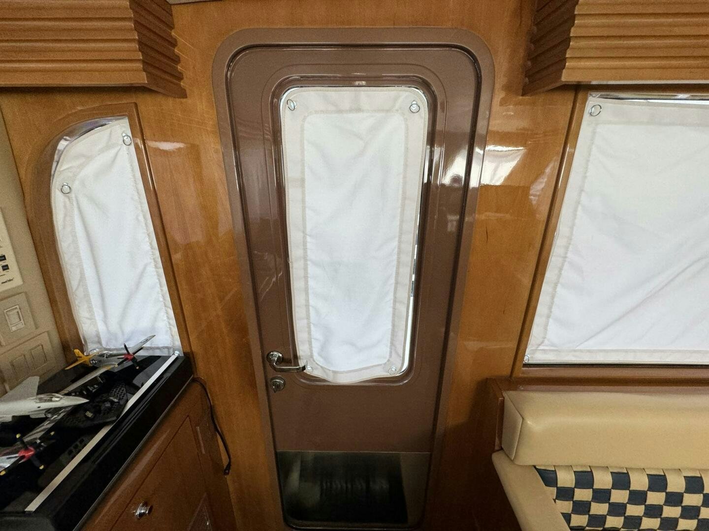 a closet with clothes on it aboard MRS. Z Yacht for Sale