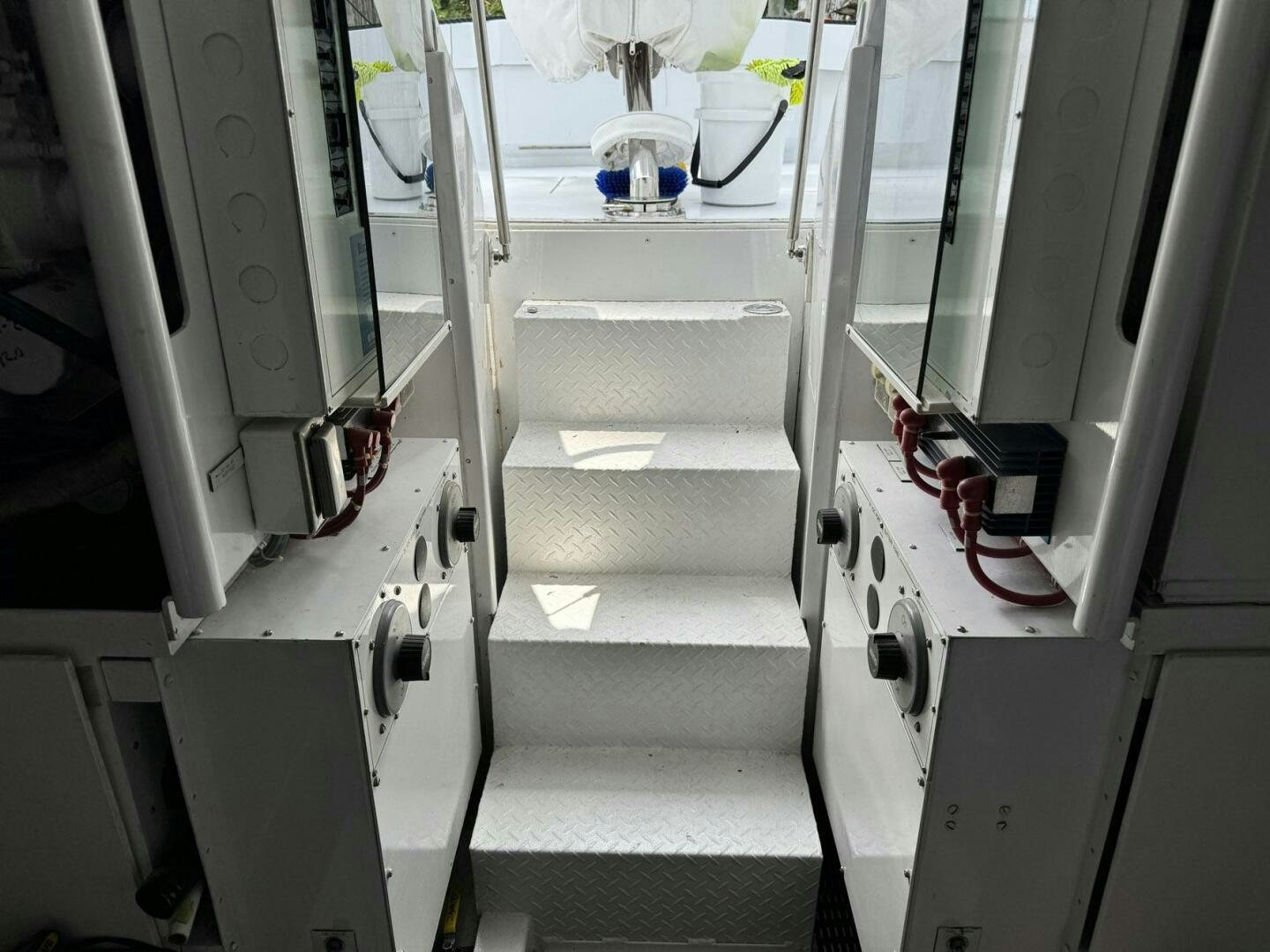 a white room with a white floor aboard MRS. Z Yacht for Sale