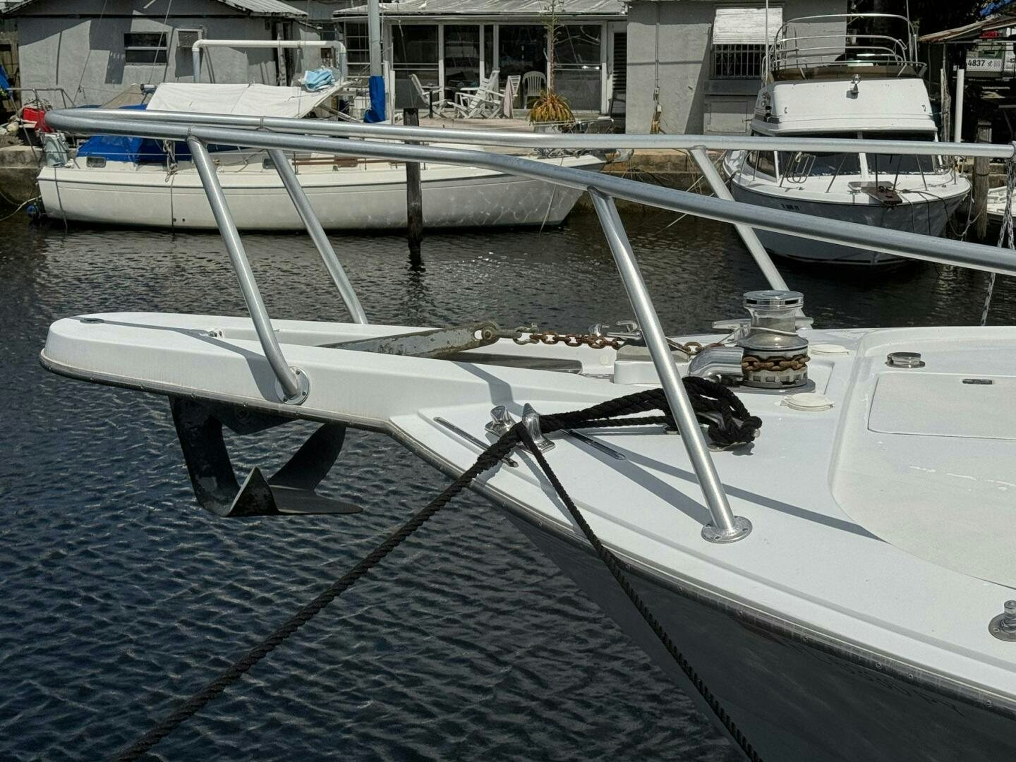 a boat parked in a harbor aboard MRS. Z Yacht for Sale