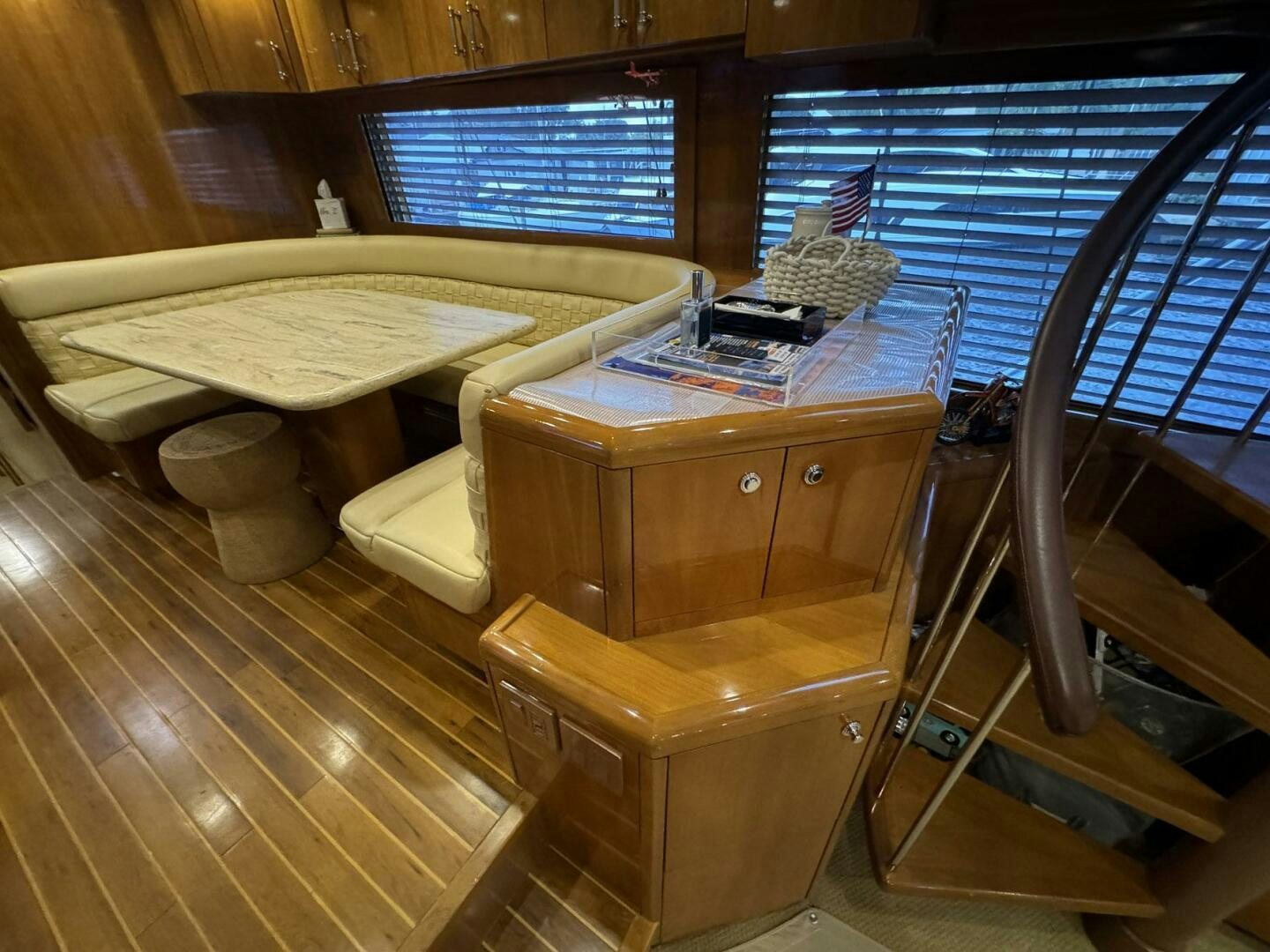 a room with a bed and desk aboard MRS. Z Yacht for Sale