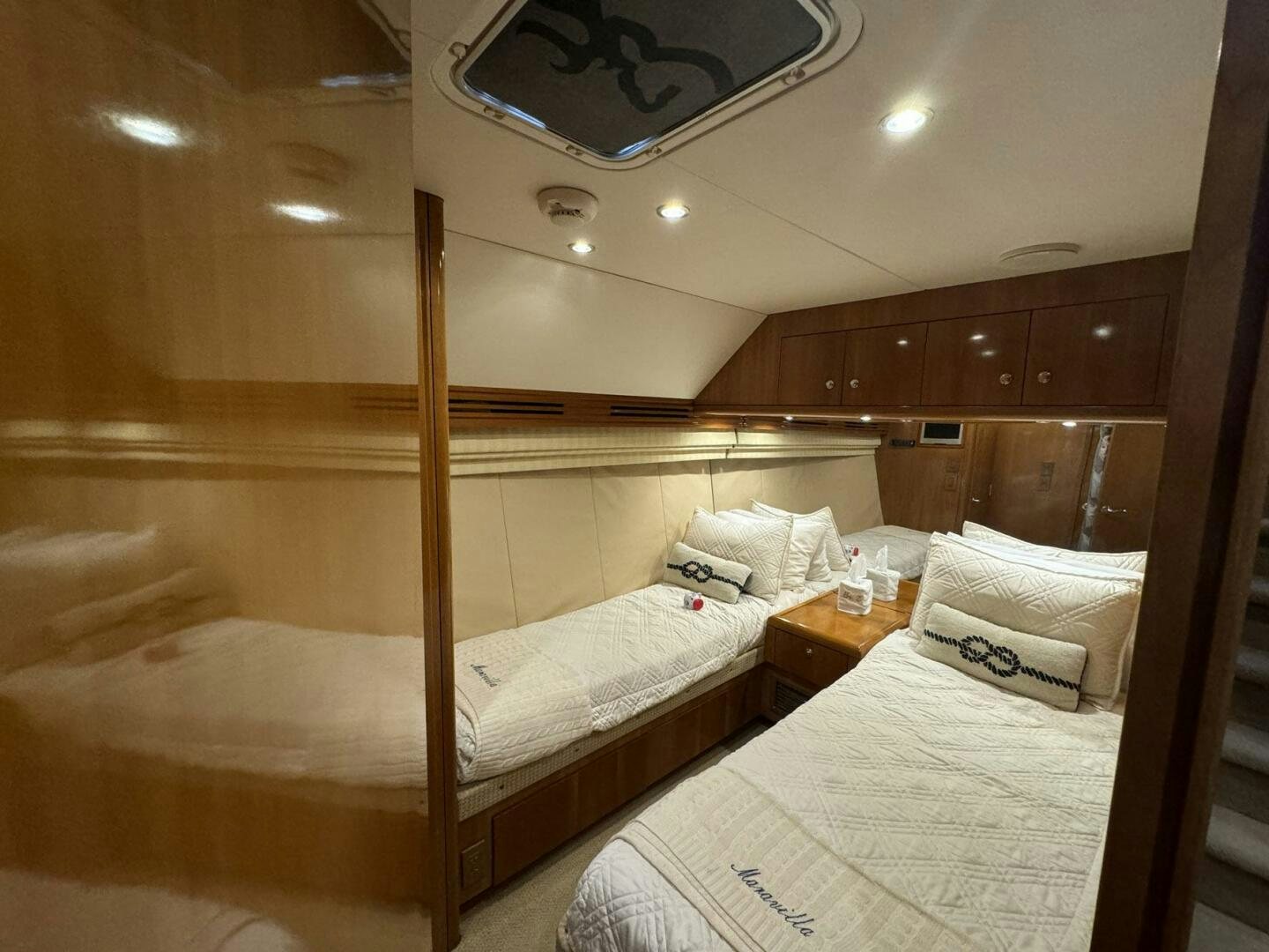 a couple of beds in a room aboard MRS. Z Yacht for Sale