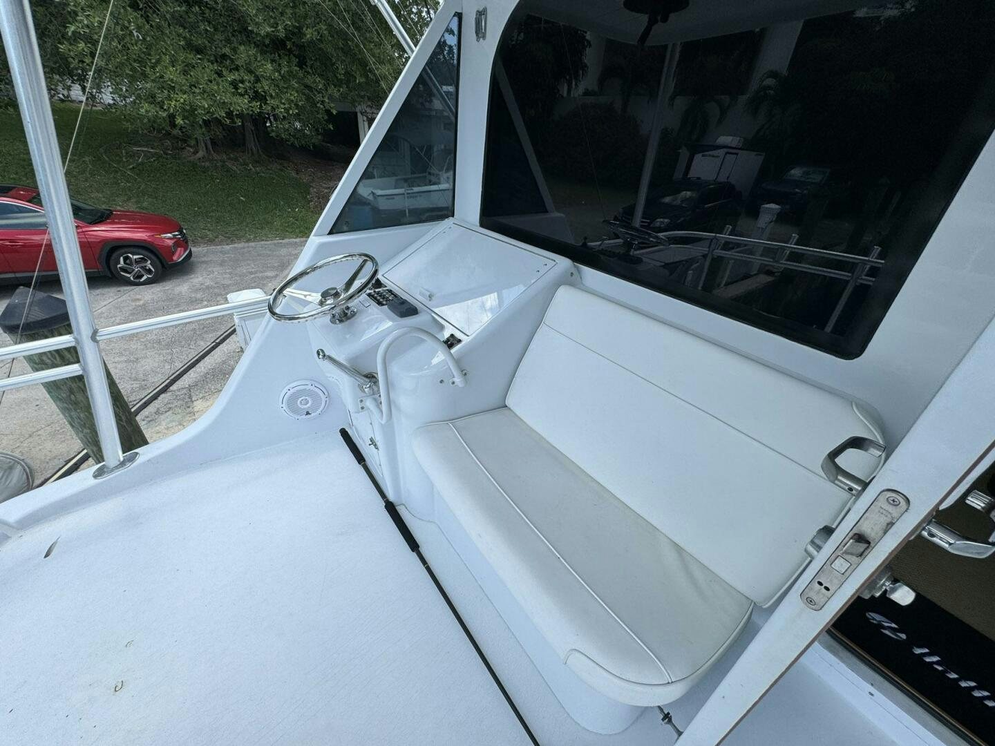 a car with a hood open aboard MRS. Z Yacht for Sale