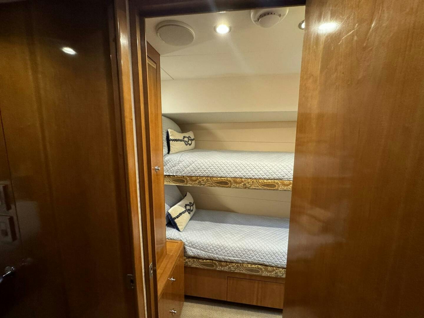 a person standing in a doorway aboard MRS. Z Yacht for Sale