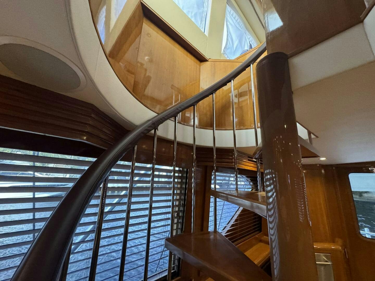 a staircase with a glass ceiling aboard MRS. Z Yacht for Sale