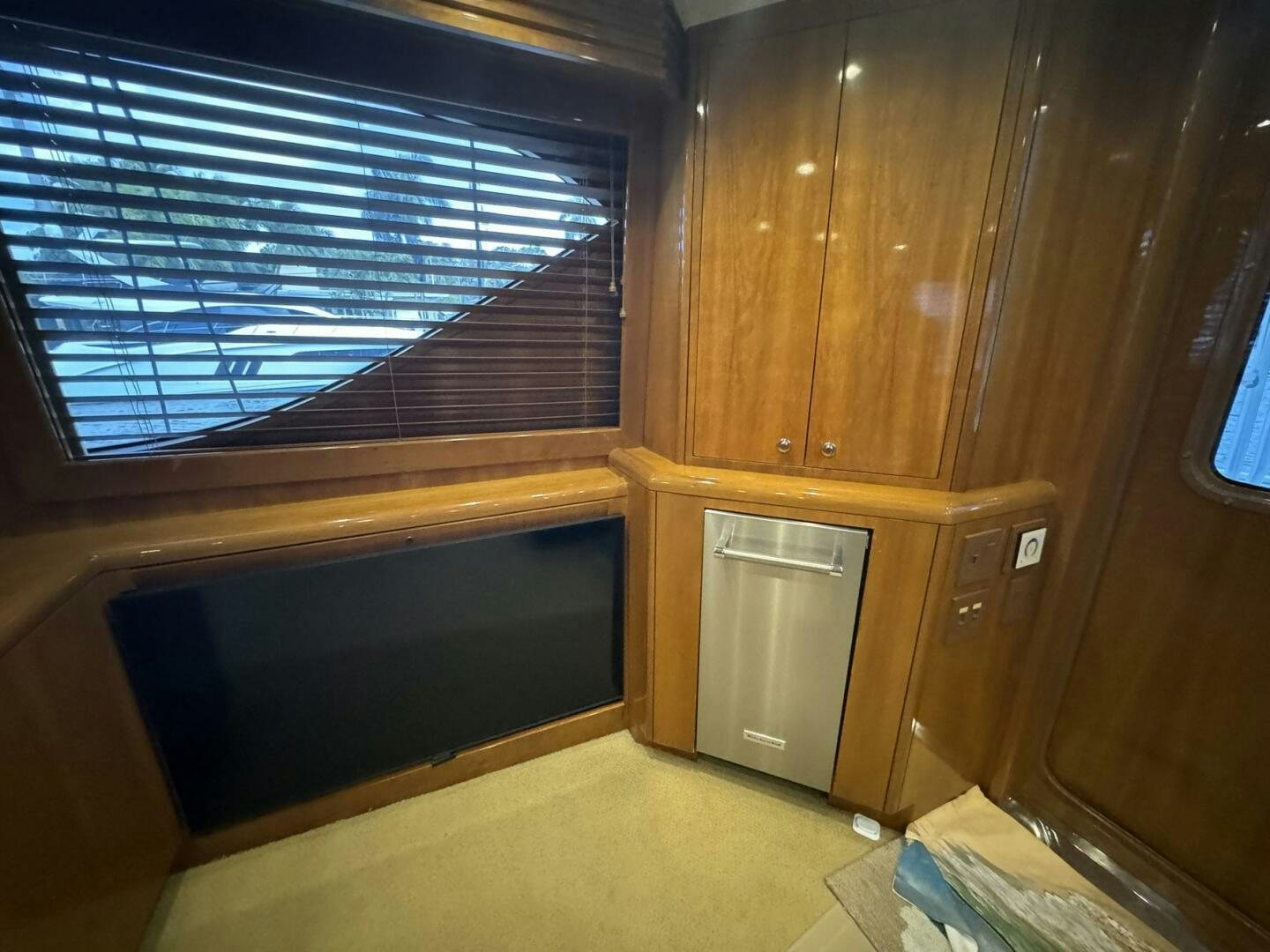 a room with wooden cabinets aboard MRS. Z Yacht for Sale