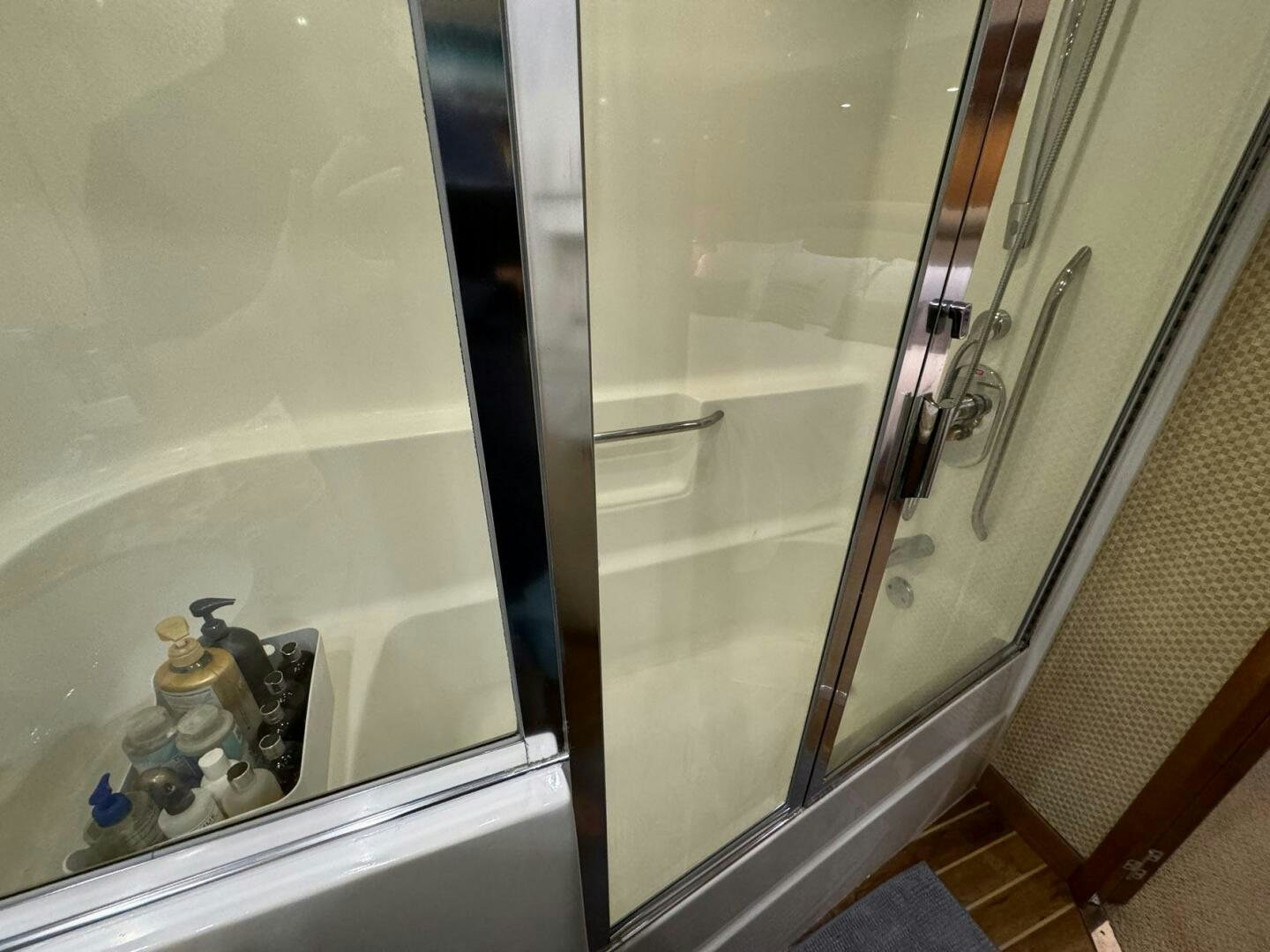 a glass door with a handle aboard MRS. Z Yacht for Sale
