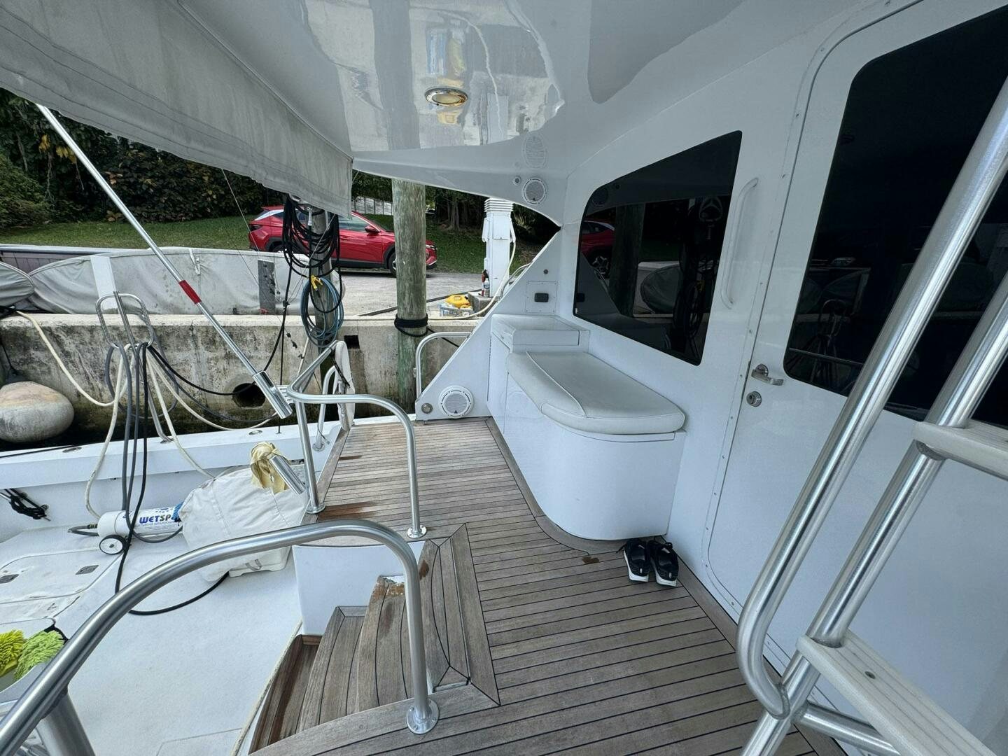 a car with a door open aboard MRS. Z Yacht for Sale