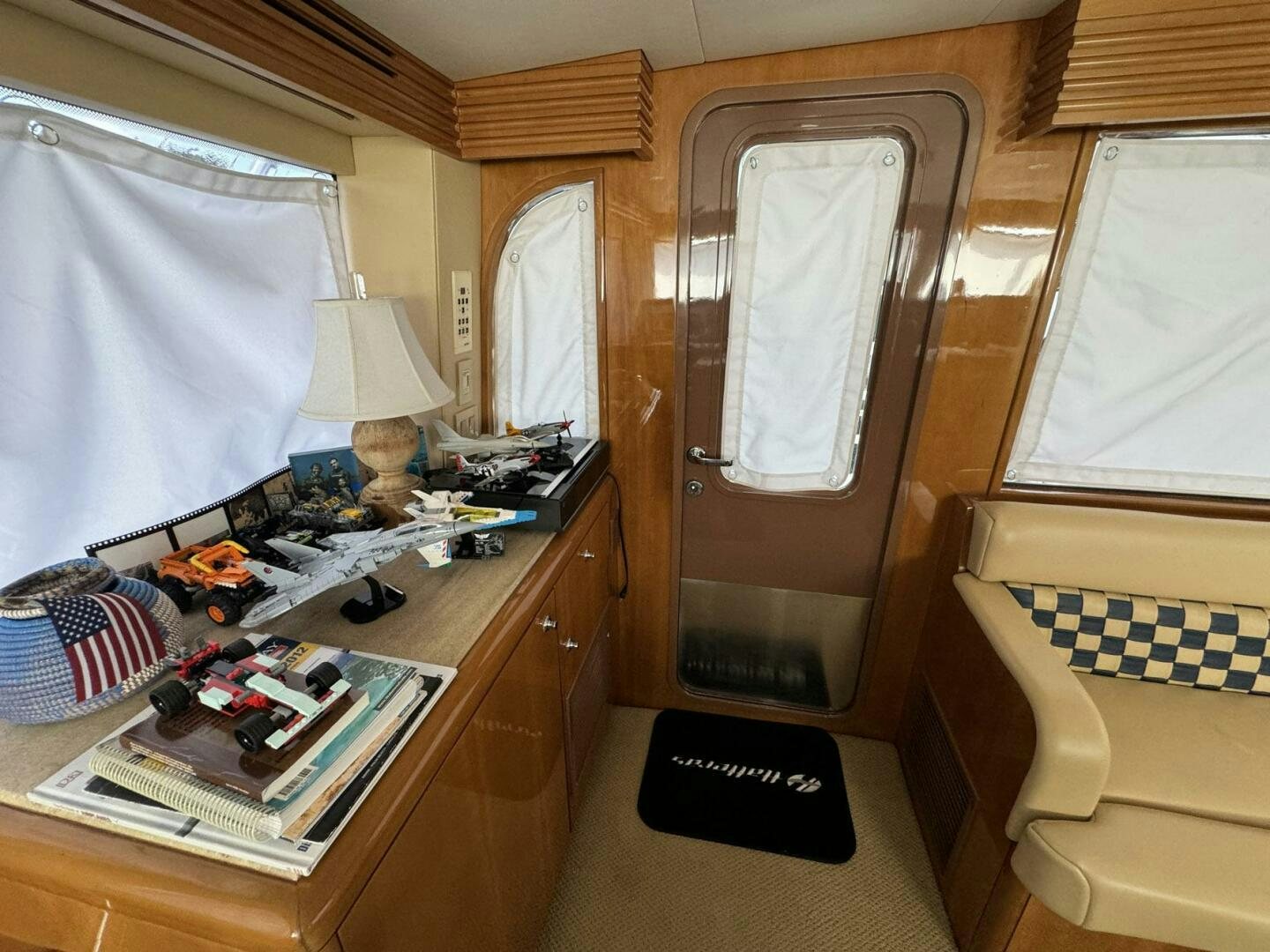 a room with a desk and a bed aboard MRS. Z Yacht for Sale