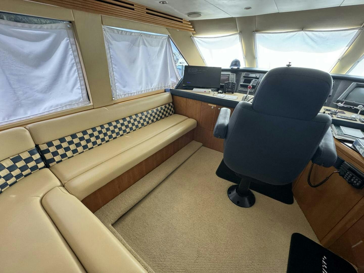 a room with a bed and a chair aboard MRS. Z Yacht for Sale